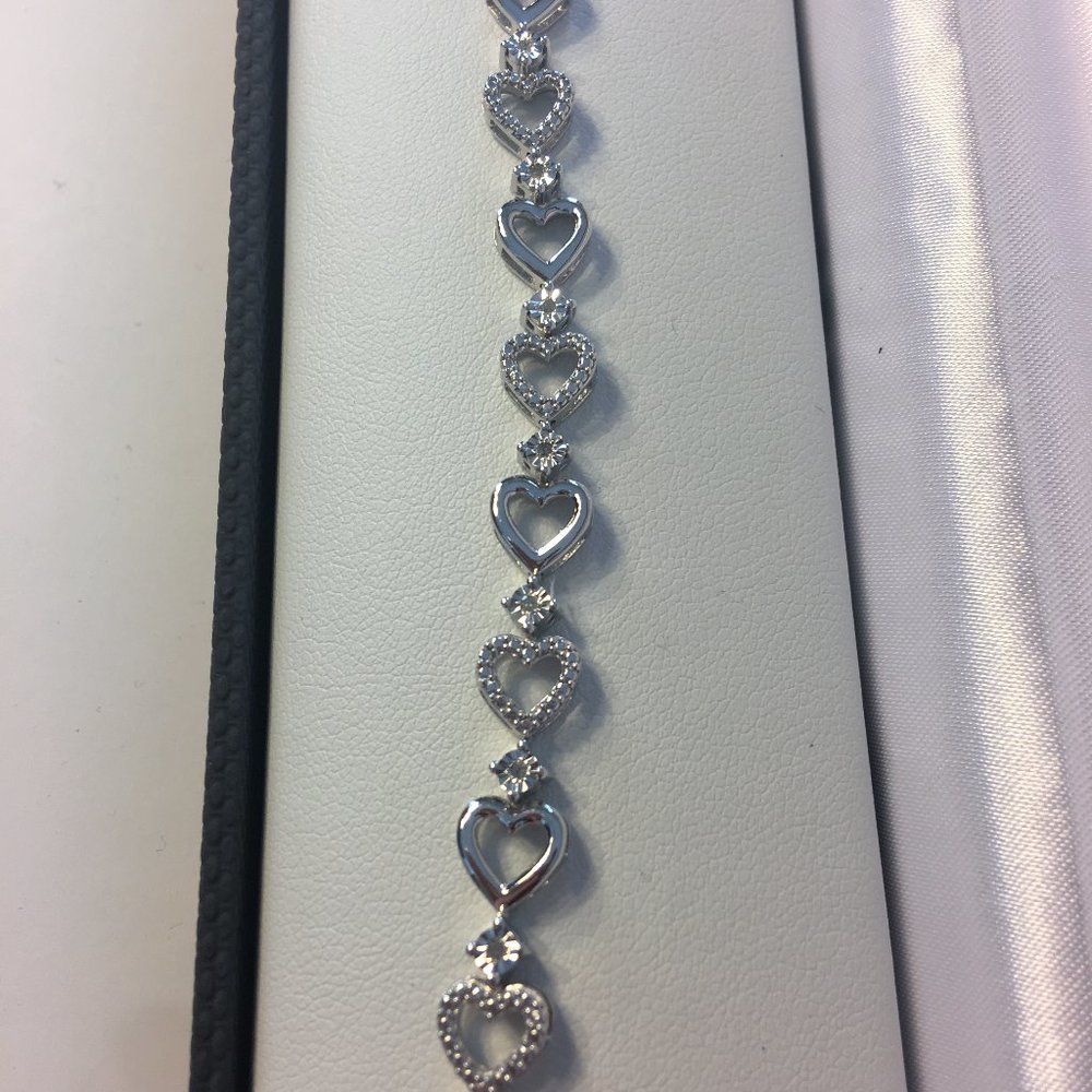 1/10 CT. T.W. White Diamond Heart Tennis Bracelet - Picture 3 of 9